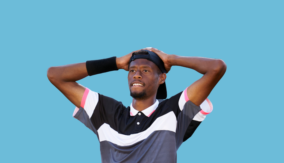 Pro tennis player Chris Eubanks stands with his hands on his head in disbelief after winning his first ATP title.